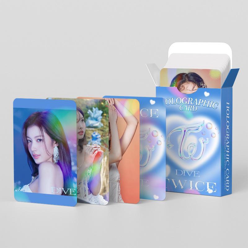 KIT TWICE DIVE - 124 PÇS (60 PHOTOCARDS HOLOGRÁFICOS + 64 ADESIVOS)